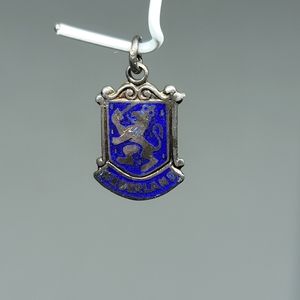 Waderland Enameled Travel Shield Silver Charm